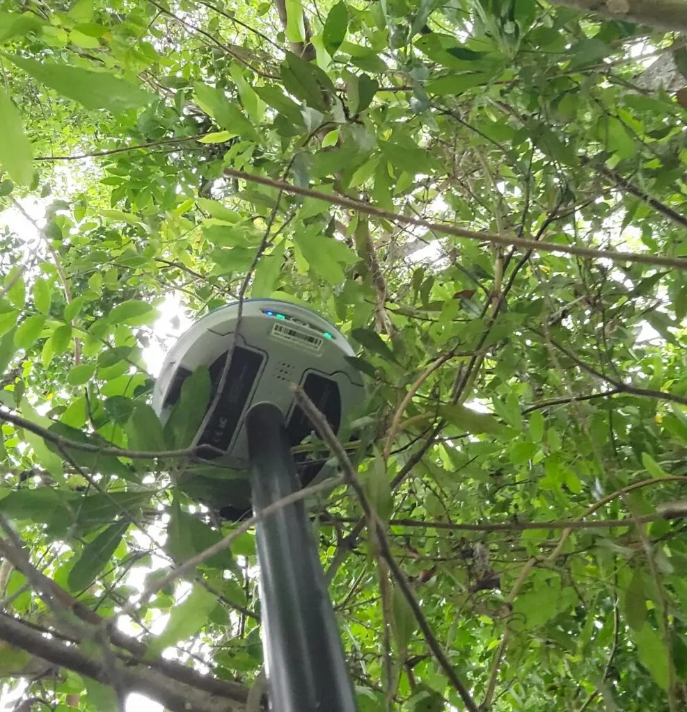 Stonex GNSS rover underneath trees and near buildings where satellite blockage and multipath can cause RTK float status